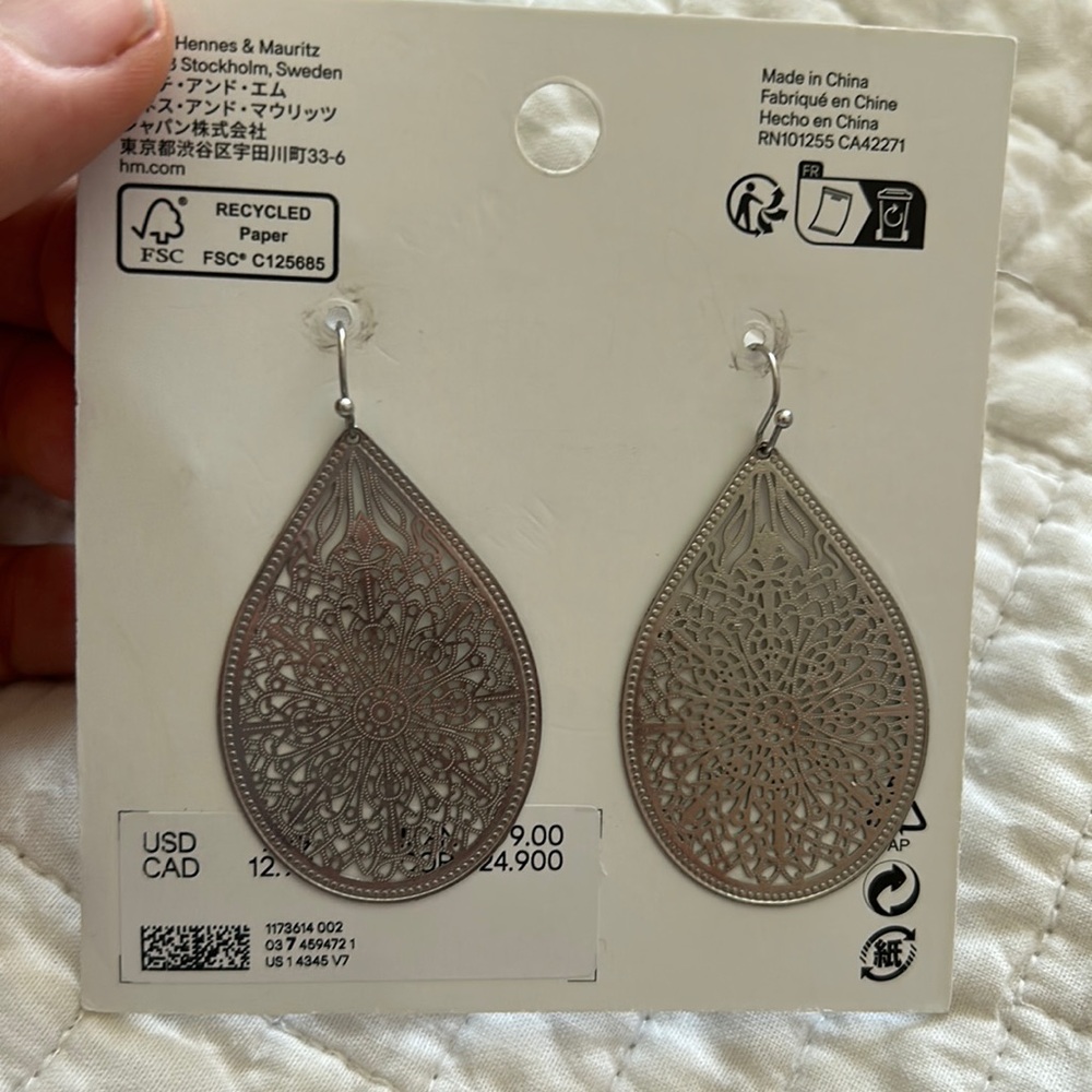 Beautiful drop shape silver color earrings